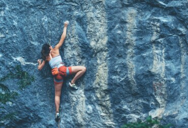 does rock climbing help you more than the normal gym?